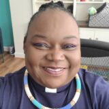 Headshot of Rev Cheni